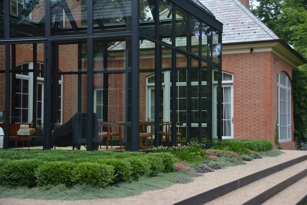 Year one - Boxwood Growth over Time. Planted in 2014 to be a table top design outside the greenhouse. Variety: Buxus ‘Green Velvet’ planted on 2" centers. From Thinking Outside the Boxwood