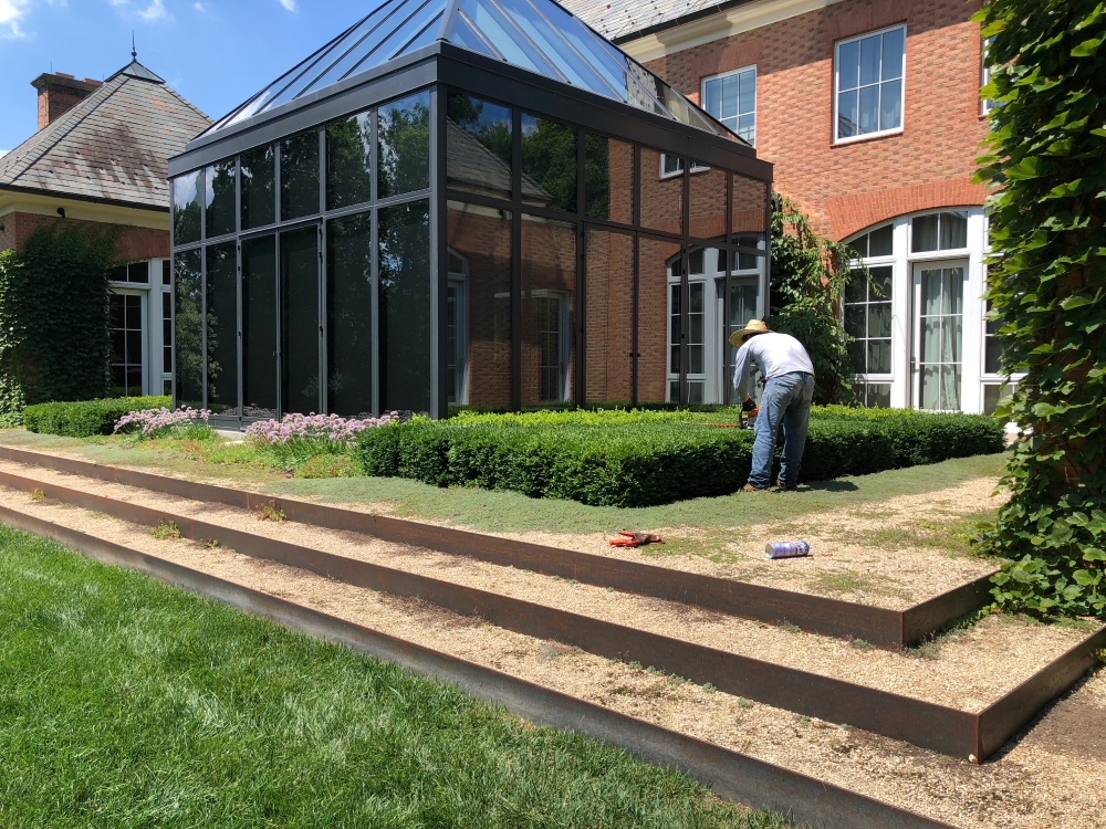 Year four- Boxwood Growth over Time. Planted in 2014 to be a table top design outside the greenhouse. Variety: Buxus ‘Green Velvet’ planted on 2" centers. From Thinking Outside the Boxwood