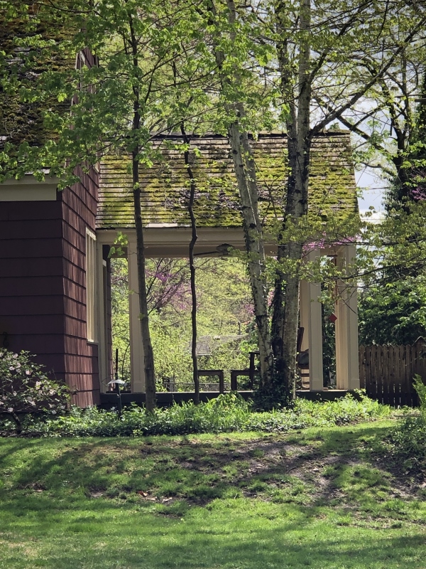 A shaded porch in Clintonville Ohio. Thinking Outside the Boxwood